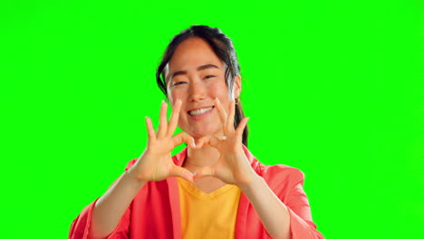 Happy-woman,-heart-hands-and-face-on-green-screen
