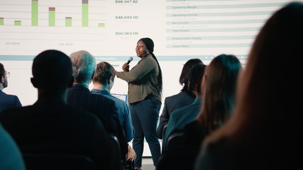 African american presenter delivering inspirational business speech