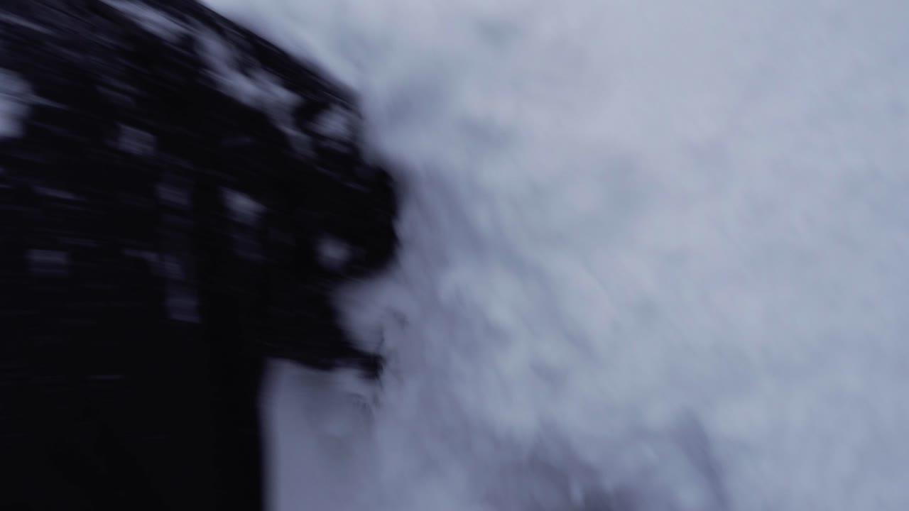 Point of view when man is walking through really deep snow in Norway
