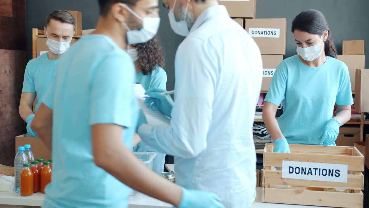 Volunteers packing donations during a food drive