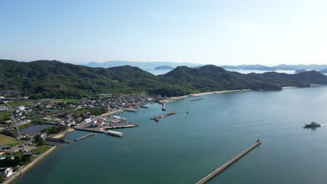 ferry entering harbor of seto inland sea island in japan