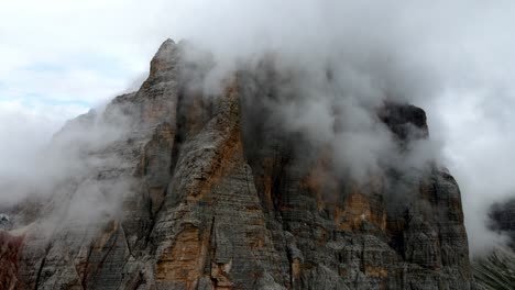 Aerial-views-of-italian-Dolomites-peaks-in-a-foggy-and-cloudy-day