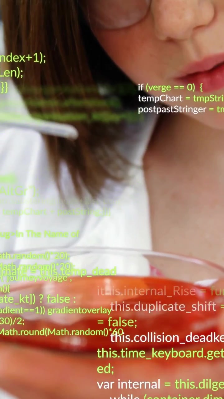 Student guiding pipette, adding drop into dish testing in science lab, code slowly overlaying view