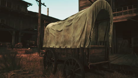 a covered wagon in a western town