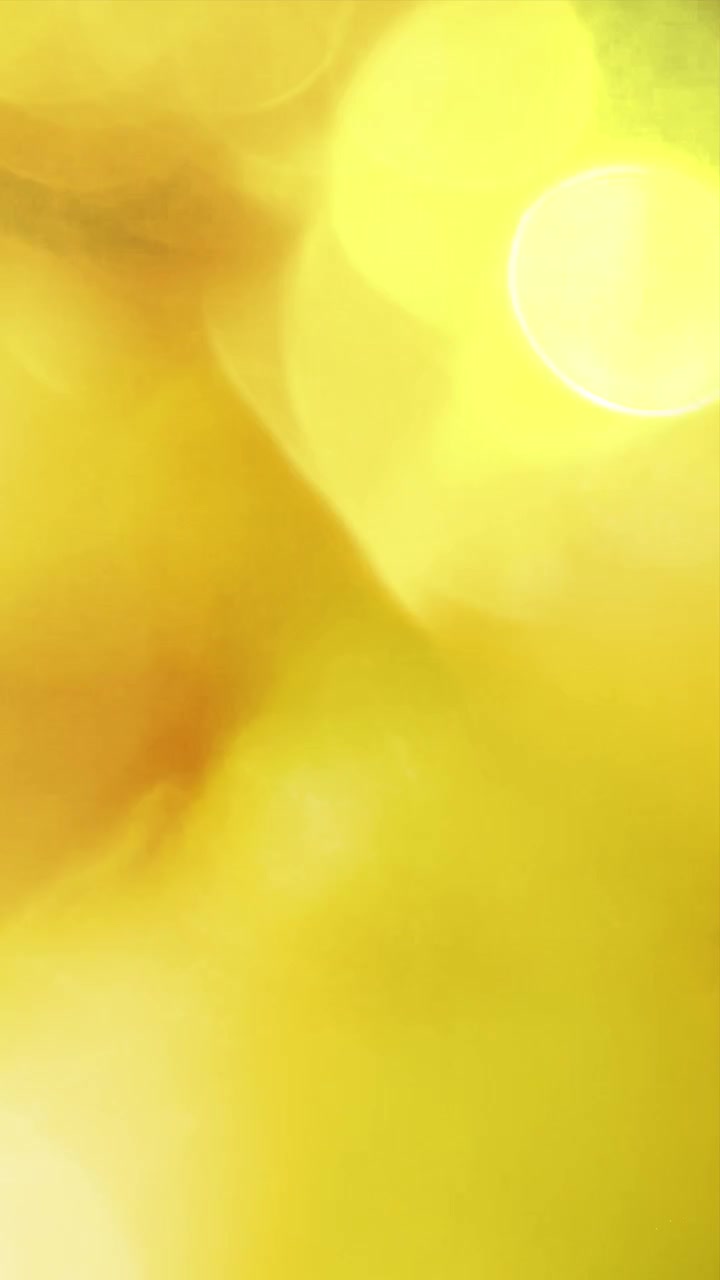Hamparan Abstrak Kebocoran Cahaya Kuning dan Hijau serta Bokeh