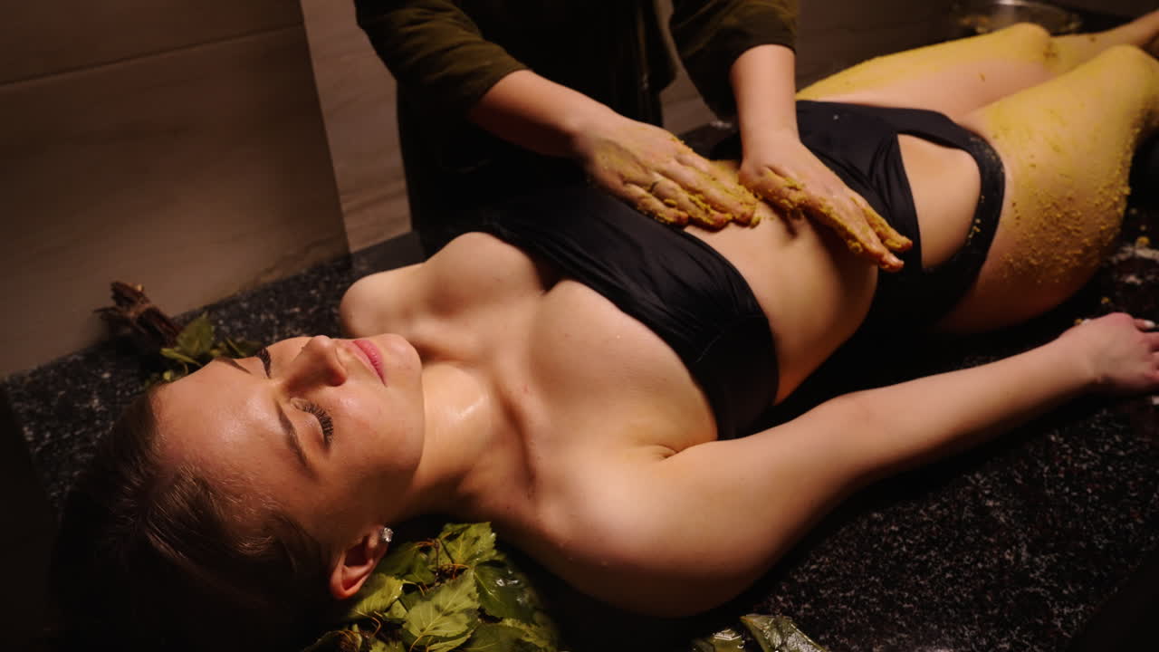 Woman Receiving Ayurvedic Abdominal Massage
