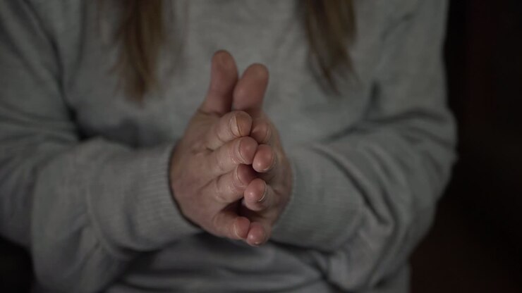 Hands slowly clapping close up shot