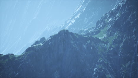 Rocks-covered-with-grass-under-a-cloudy-sky