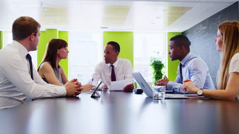 male boss talk to business colleagues at informal meeting