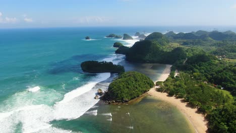 Paradise-Asmara-beach,-tropical-forest-meets-turquoise-ocean-on-Java,-Indonesia