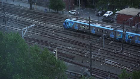 Metro-Train-Traveling-On-Suburban-Railroads-In-Melbourne,-Australia