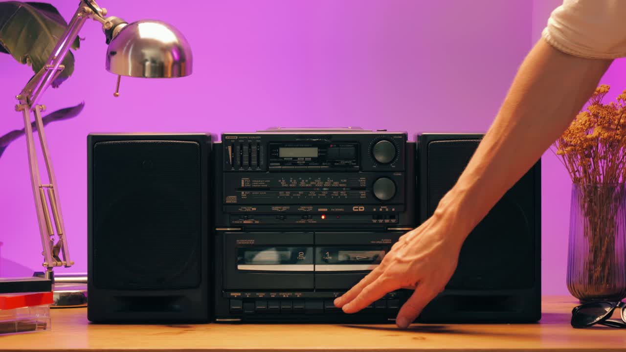 Retro radio tape recorder, audio cassette close-up. Listening to music, old radio boom box player, macro of vintage music listening. . High quality 4k footage