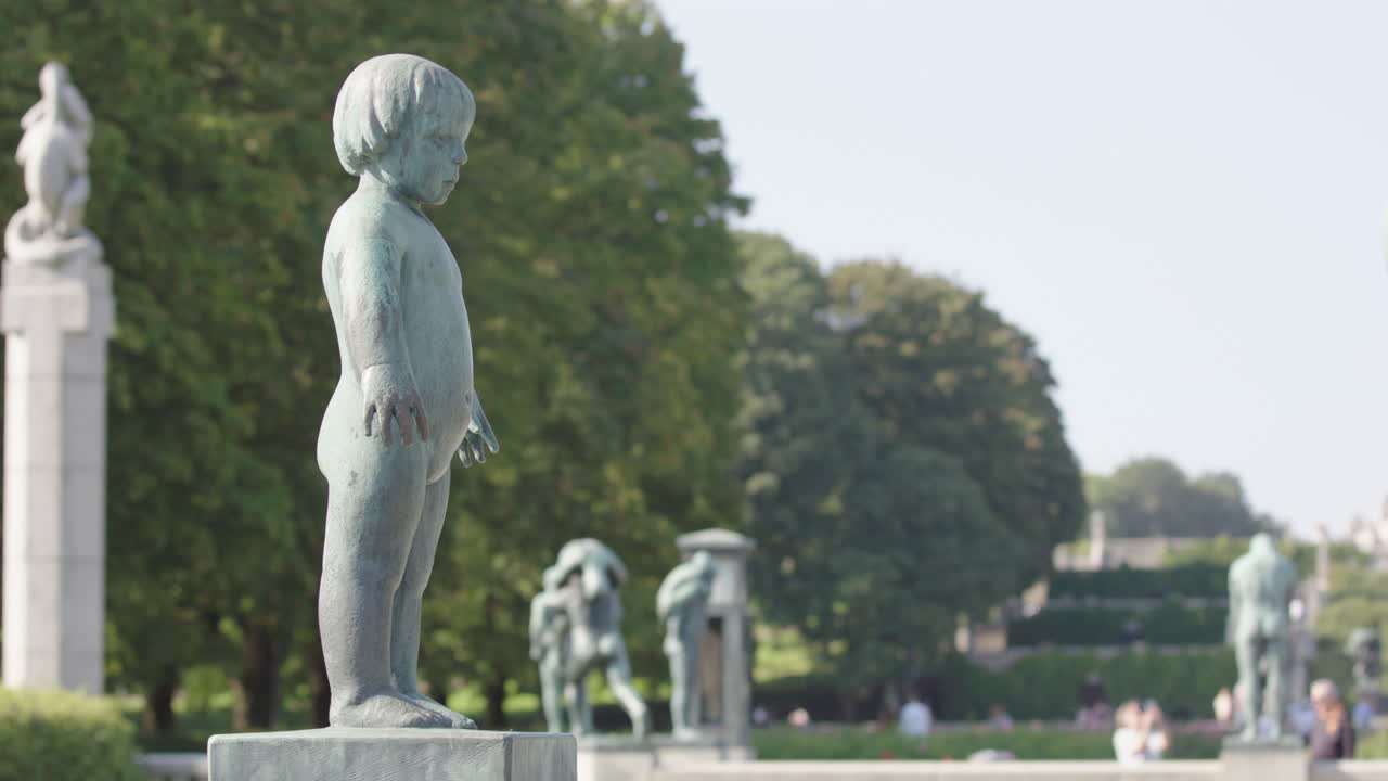 A sad looking young bronze child in Vigeland Sculpture Park, Oslo