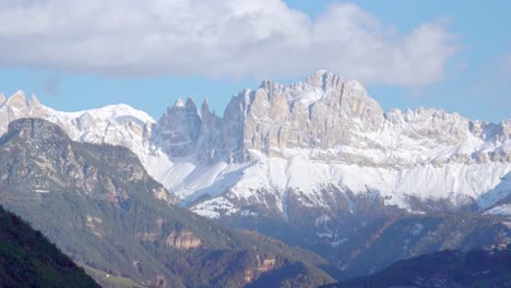 Zooming-out-on-Latemar-and-Rosengarten-Massif-with-Mount-Tschafon,-South-Tyrol,-Italy,-on-a-sunny-day-in-late-autumn