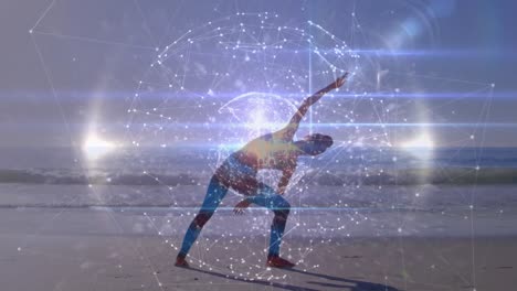 animation of networks of connections with globe over caucasian woman praciticing yoga on beach