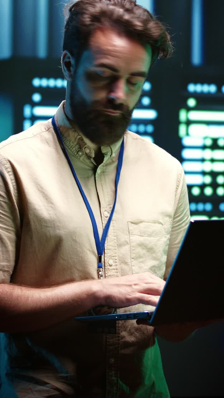 Vertical video Technician checking server hub