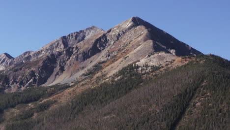 Ten-Mile-Range-Summit-County-fall-colors-avalanche-path-mountain-peak-downtown-Frisco-Lake-Dillon-Colorado-aerial-cinematic-drone-morning-view-Breckenridge-Silverthorne-circle-right-zoom-movement