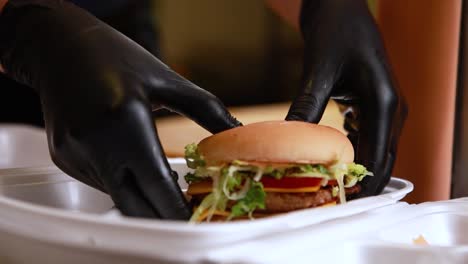 preparing a burger for delivery