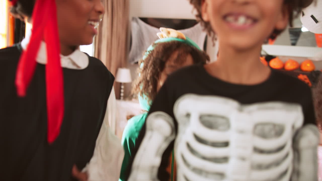 Kids in Halloween Costumes at a Party