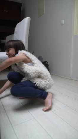 girl playing on the floor