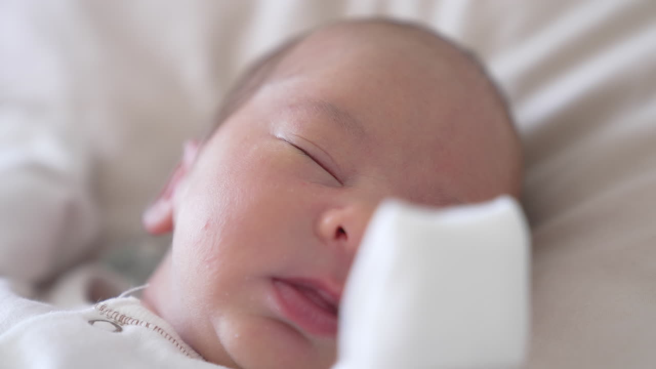 Close up small cute newborn baby. Little newborn baby sleeping.