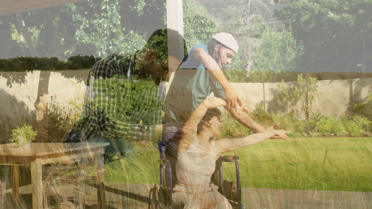 Assisting woman in wheelchair with dance movements, man in garden animation