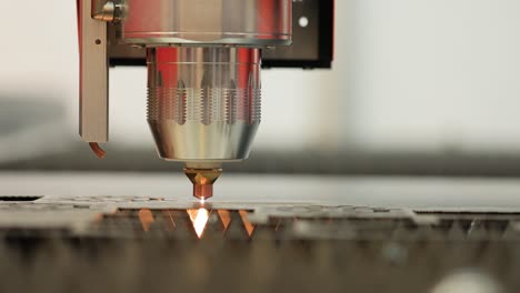 CNC-Laser-cutting-of-metal,-modern-industrial-technology.