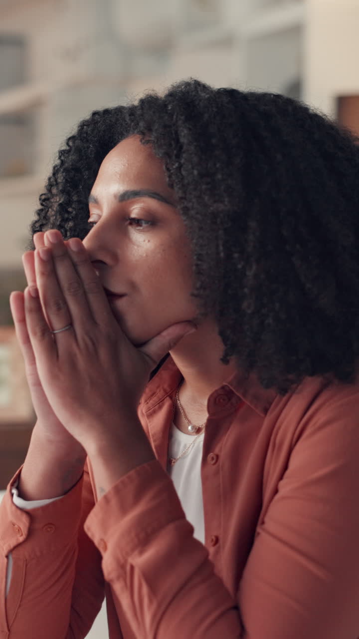 Woman with Curly Hair in Deep Contemplation or Prayer