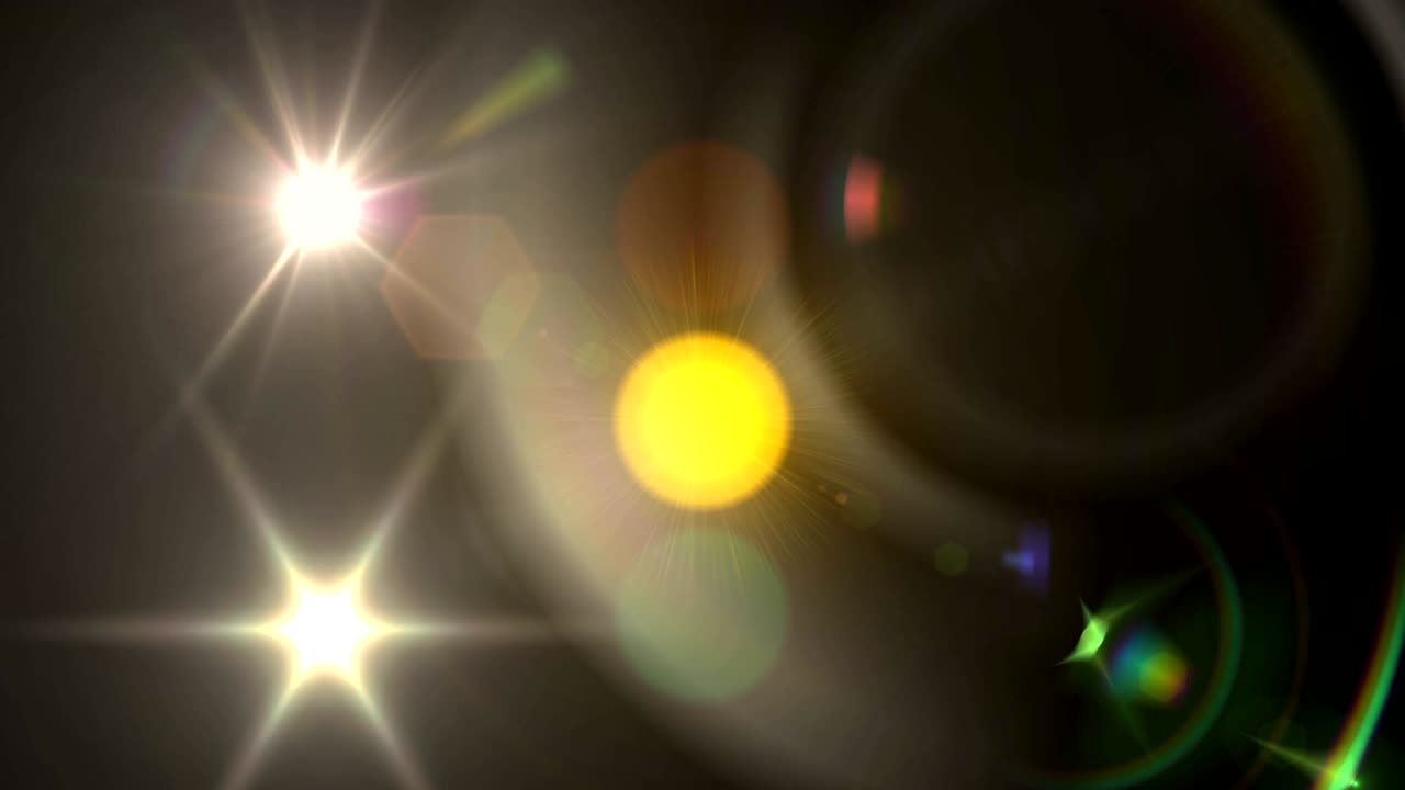 manchas brillantes de luz contra un fondo negro