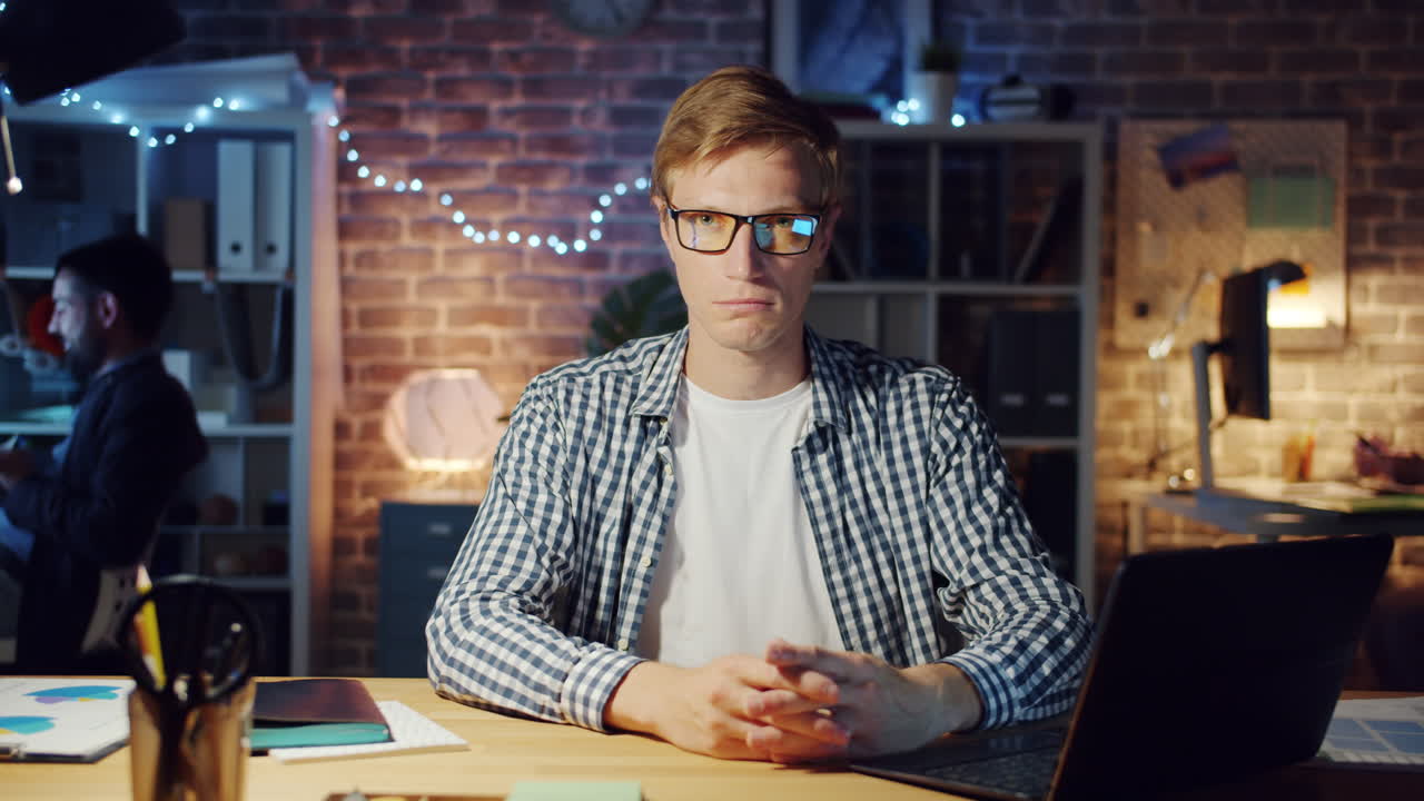 Man Working Late at Night in the Office