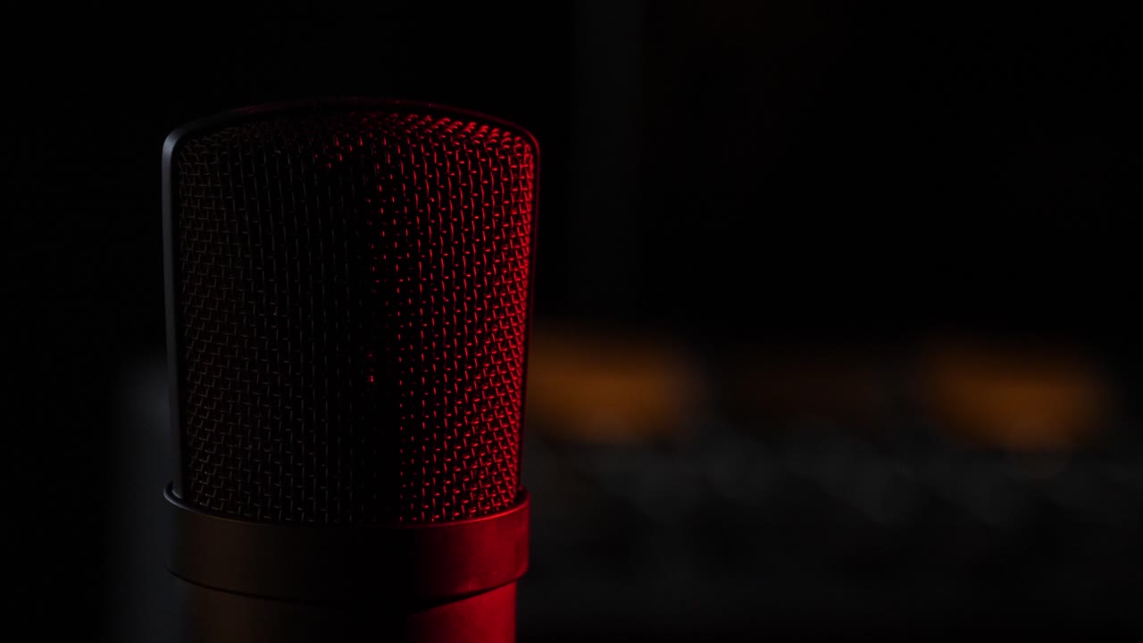 Microphone in the studio on the air with a mixing board