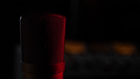 microphone in the studio on the air with a mixing board