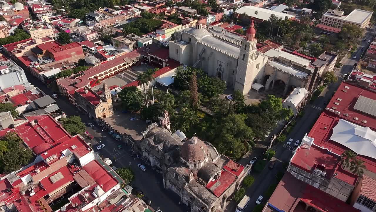 Cuernavaca with a historical church and colorful rooftops, aerial view