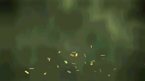 Animation-of-gold-confetti-falling-on-green-background