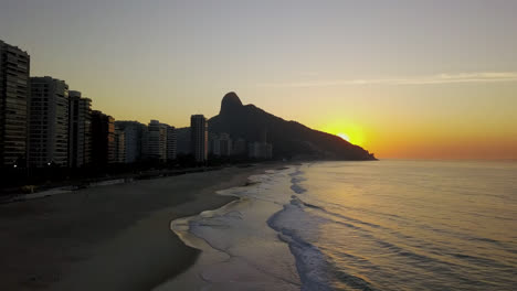 sunrise lite ocean at praia do pepino brazil.