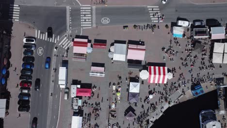 aerial looks down onto laukontori waterfront market in tampere finland