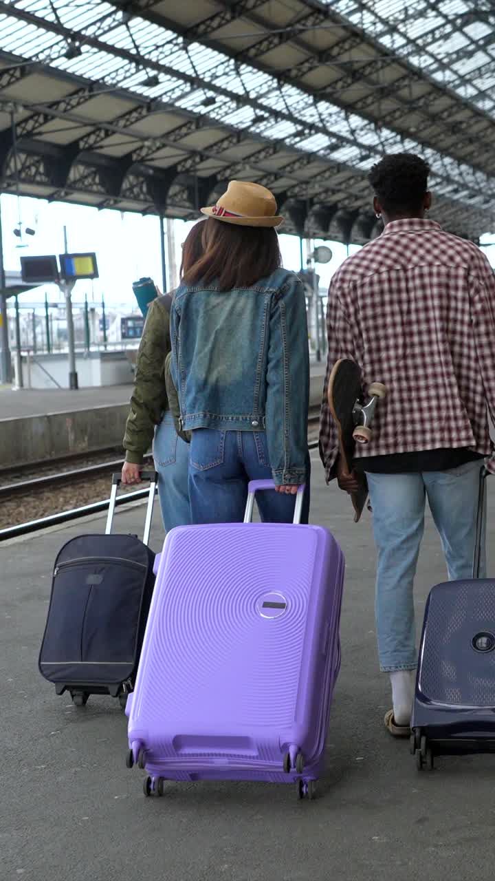 Young adults at the train station