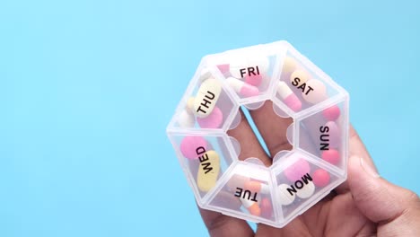 weekly pill organizer with pills