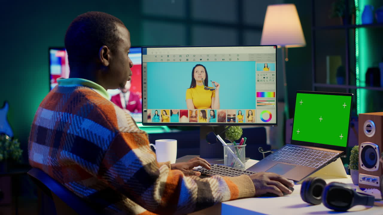 Man Working on Photo Editing with Green Screen