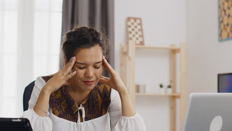 Tired-woman-in-home-office