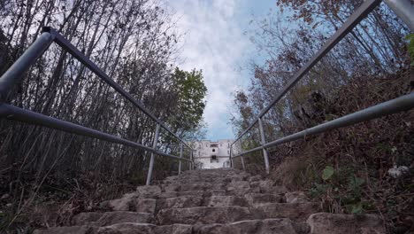 stone steps leading up to a castle