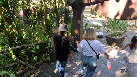 group walking through lush zoo environment