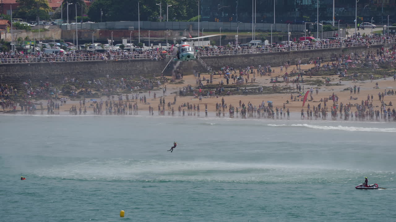 Helicopter Water Rescue on Crowded Beach