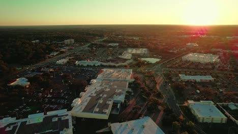 Aerial-shot-of-Gainesville-city-with-bright-sky-in-the-background,-Florida,-USA