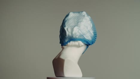 medical mannequin wearing protective gear