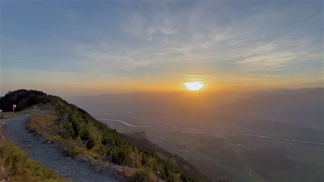 wonderful aerial shot with a drone in the mountain, recording the sunrise, swiss alps, switzerland