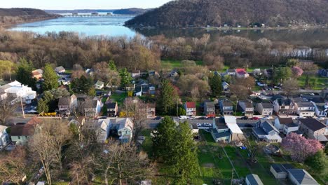 Residential-area-in-rural-Pennsylvania,-aerial-sideways