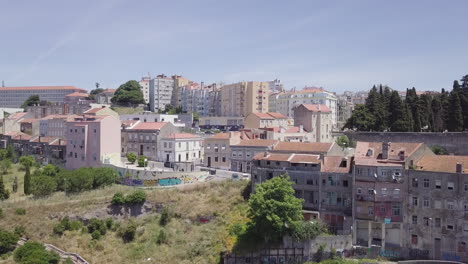 drone aerial shot of run-down buildings in casal ventoso, a neighborhood in lisbon known as the epicenter of portugal's drug crisis