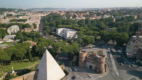 Ascending-Drone-Shot-Reveals-Greater-Rome,-Italy-with-Pyramid-in-Foreground