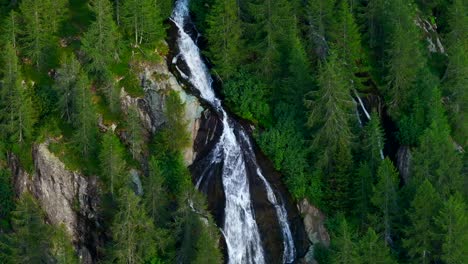 Mountain-waterfall-in-Valmalenco-valley-of-Valtellina-in-summer-season,-Northern-Italy